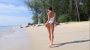 beach girls tease - Sexy teen on a beach teasing with her ass in one piece bikini - XVIDEOS.COM