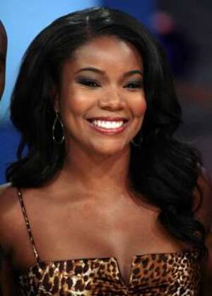 gabrielle union hot lesbian gallery - Gabrielle Union, Relishing Her Latest 'Holiday' Treat