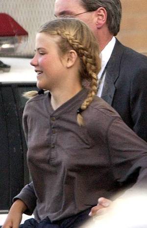 Kidnapping - FILE - In this March 12, 2003, file photo, Elizabeth Smart is rushed