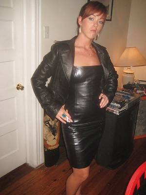 hot leather dress - hot redhead in leather outfit