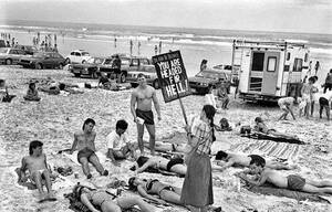 1980s topless beach - Puritan picket against too revealing swimwear on a Florida beach, 1985. USA  â€œYou will follow to Hell.â€ [800x513] : r/HistoryPorn