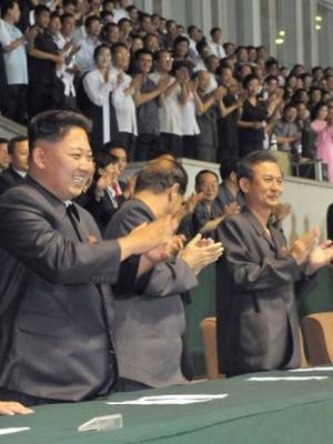 North Korea Leader Porn - North Korea leader Kim Jong-un (L) applauds during the final of the