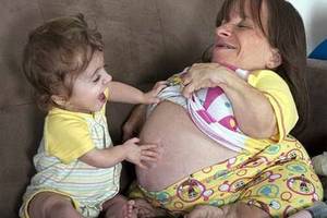 huge pregnant stomach with dectuplets - 