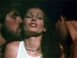 Annette Haven Bdsm Porn - Annette Haven giving double handjob to 2 male strippers