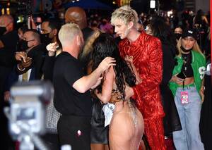 Megan Fox Ass Sex - MTV VMAs red carpet - Megan Fox flaunts butt in sheer dress & THONG with  Machine Gun Kelly, Travis Barker & Kourtney | The US Sun