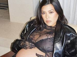 kourtney pregnant belly naked - See Kourtney Kardashian Show Her Bump in a Sheer Crop Top and Leather  Separates