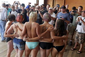 naked at beach candid shots - Rain puts damper on New Hampshire topless beach protest