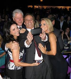 Bill Clinton Porn Stars - Bill Clinton poses with 'prostitutes' at charity event | Al Arabiya English