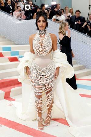 Kim Nude Porn - Met Gala 2023: Kim Kardashian Stuns Pearl-Adorned Naked Dress