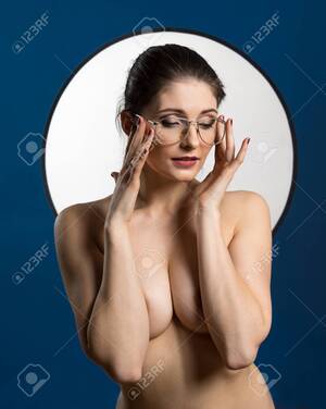 naked lady glasses - Young Nude Woman With Make Up. Model With Glasses. Naked Girl Beauty  Portrait On Blue Background. Stock Photo, Picture and Royalty Free Image.  Image 114679434.