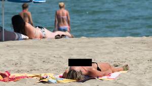 beach topless sunbathing videos - Topless sunbathing is on the decline among women in France, survey says