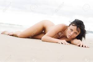 laying naked on beach gallery - Nude Woman Laying On Beach Stock Photo, Picture and Royalty Free Image.  Image 801706.