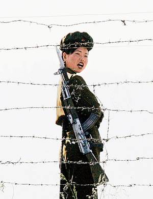 North Korean Jail Porn - Guard: A female North Korean soldier