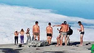 best walking beach nude senior - A group of 10 people accused of stripping before taking photographs at the  peak of the