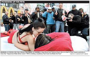 lesbians making out in bed - ... in the middle of the busiest intersection of New York's busy metro  area, PETA continued its \