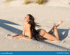 beach topless sunbathing videos - Nude Woman Sunbathing on the Beach Stock Image - Image of pretty, activity:  32815859