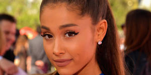 Ariana Grande Ponytail Porn - Ariana Grande Is So Committed To Her Ponytail, She Cut A Hole In Her Hat  For It