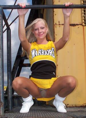 college cheerleaders upskirt glossy pantyhose - Cheerleader showing Upskirt in Shiny Pantyhose and Yellow Miniskirt