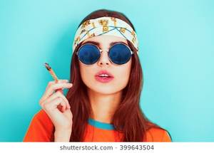 natural nude hippie girl - Hippy girl smoking weed and wearing sunglasses