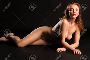 blonde black nudes - Beautiful tall nude blonde on a black background Stock Photo - 13091268