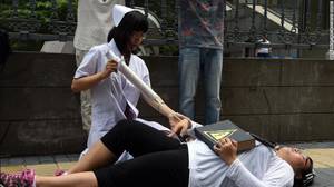 chinese sex therapy - Activists stage a protest against so-called gay conversion therapies  outside a Beijing court in