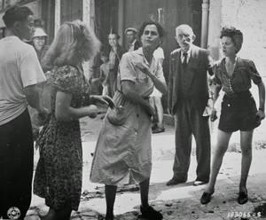 French Women Collaborators Punished Porn - In the streets of Brignoles, angry French citizens publicly rebuke a woman  who is suspected of having collaborated with the Germans.