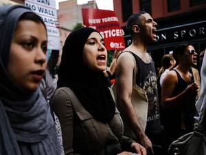 Banned Family Three Some - Recent Immingrants join activists for an evening protest