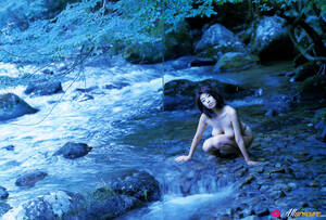 naked asian rocks - Naoko Inoue Asian exposes nude curves on rocks and in the river