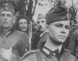 Ko%c5%84skie - Director Leni Riefenstahl looks at an execution of Polish civilians in  KoÅ„skie, 1939