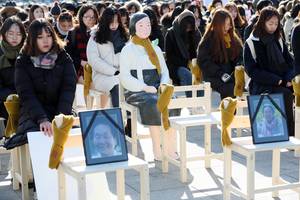 Korean Student Sex - People take part in a 'comfort women' rally in Seoul, sitting with a