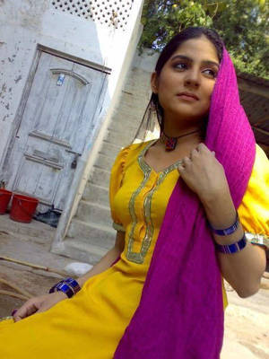 Balochi Porn - Sanam Baloch in traditional yellow Dress