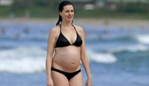 hawaiian pregnant nude - Candids of a pregnant Anne Hathaway at the beach in Hawaii! Not a big fan  of the pregnant look but I like the pokies.