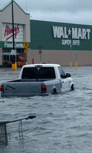 Flushed Away Rita Porn - Storm water stands 2- and 3-feet deep in the parking lot of the