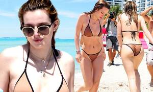 Bella Thorne Porn Captions 2016 - Bella Thorne and sister Dani frolic in the surf on bikini break in Miami |  Daily Mail Online