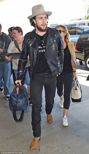 Aaron Taylor Johnson Porn - Sam Taylor-Johnson is lead through LAX airport by husband Aaron