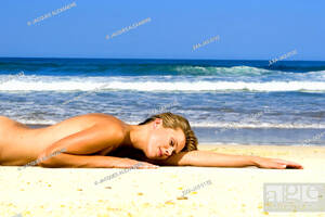 laying naked on beach gallery - Nude woman laying on sand at beach, Stock Photo, Picture And Rights Managed  Image. Pic. EXA-JA3-0132 | agefotostock