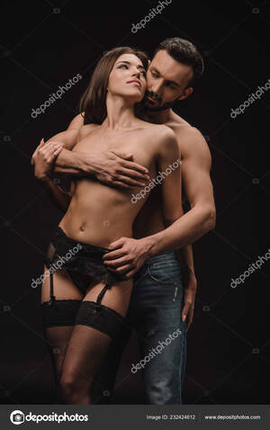 hug naked tits - Sexy Man Hugging Nude Breast Seductive Girlfriend Isolated Black Stock  Photo by Â©VitalikRadko 232424612