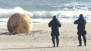 Bizarre Beach - Huge mystery metal sphere discovered as cops close beach â€“ can you work out  what it is? - Daily Star