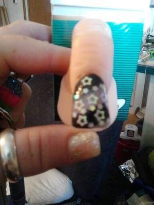 Black Stars With Nail Polish - Acrylic nail: practice finger- twinkle glow and black star glitter mixes I  made with