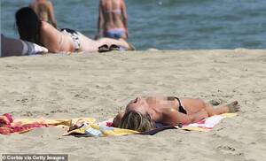 beach topless sunbathing videos - Fury as topless sunbathers are told to cover up their breasts by French  police | Daily Mail Online