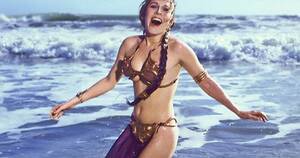 naturist beach fap - Carrie Fisher all wet at the beach in the famous Purple and Gold Slave  Bikinni : r/pics