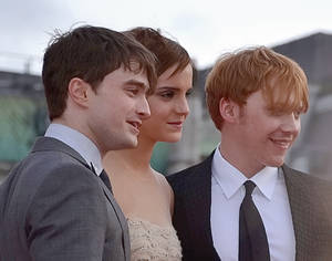 Cate Obrien Drew Carey Porn - Daniel Radcliffe, Emma Watson, and Rupert Grint of the Harry Potter film  series at a London premiere