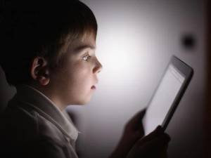 Explicit Banned Porn - A boy uses an Apple Ipad tablet computer Christopher Furlong/Getty Images