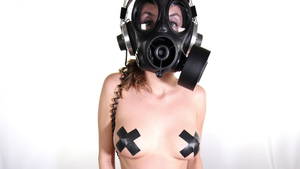 Gas Mask Girl Sexy - 4k stop motion of sexy woman with beautiful body dances with a gas mask  covering her