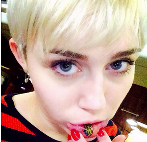 Miley Cyrus Wet Pussy - Miley Cyrus' Emoji Tattoos Make Me Feel Emotionless | Culled Culture