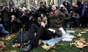 group face sitting - Face-sitting protest outside parliament against new porn rules