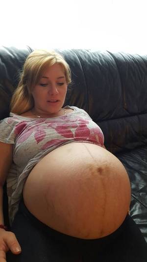 huge pregnant stomach with dectuplets - Pregnancy