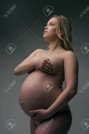 hot pregnant blonde nude - Pregnant Blonde In The Nude Cropped Shot Stock Photo, Picture and Royalty  Free Image. Image 101868521.