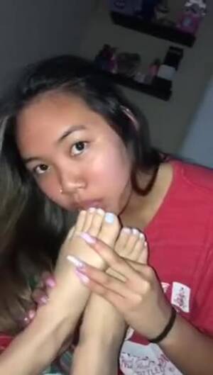 asian sucking toes - Young Asian teen enjoys sucking her girlfriend's amateur toes in POV - Feet9