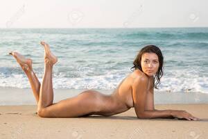 laying naked on beach gallery - Nude Girl Lying On Stomach In Graceful Pose On Sand Beach Against Sea Stock  Photo, Picture and Royalty Free Image. Image 113461679.